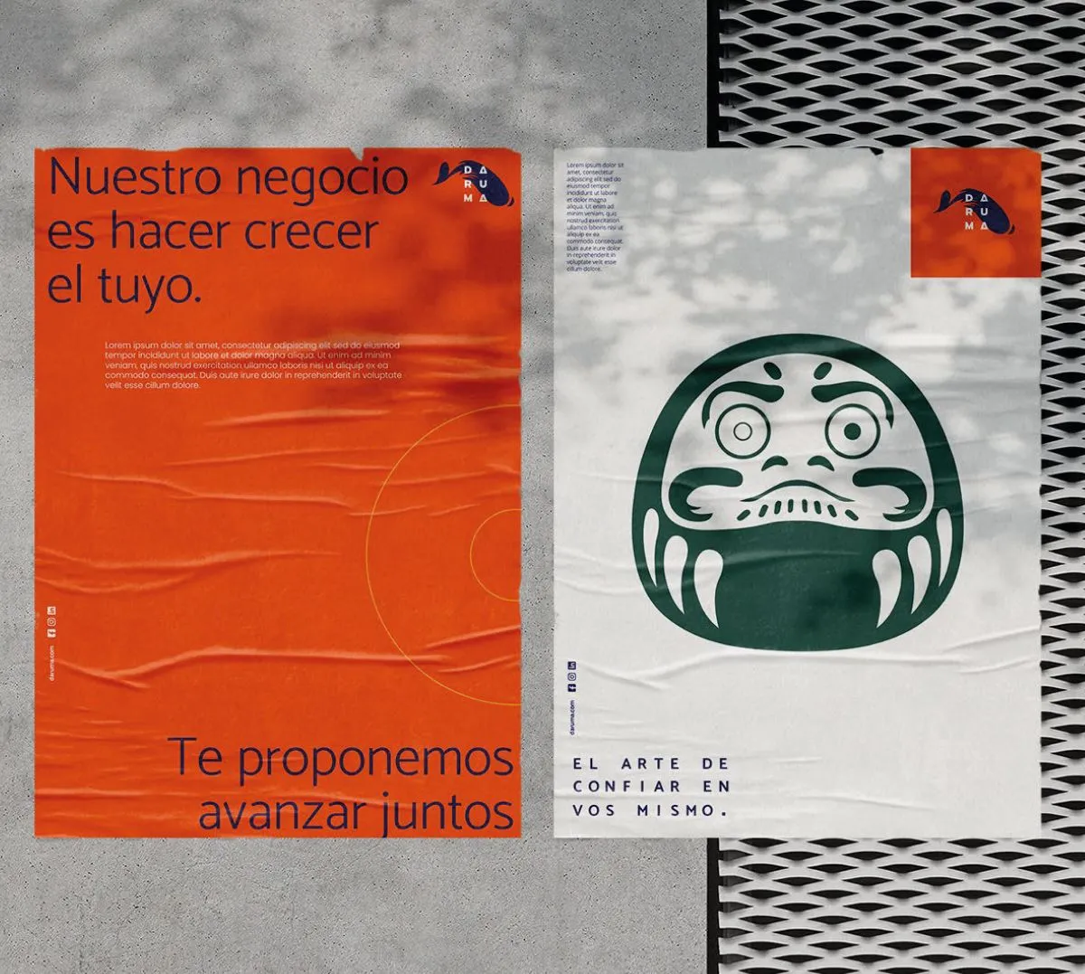 Poster pair over concrete: brand statements beside the daruma face