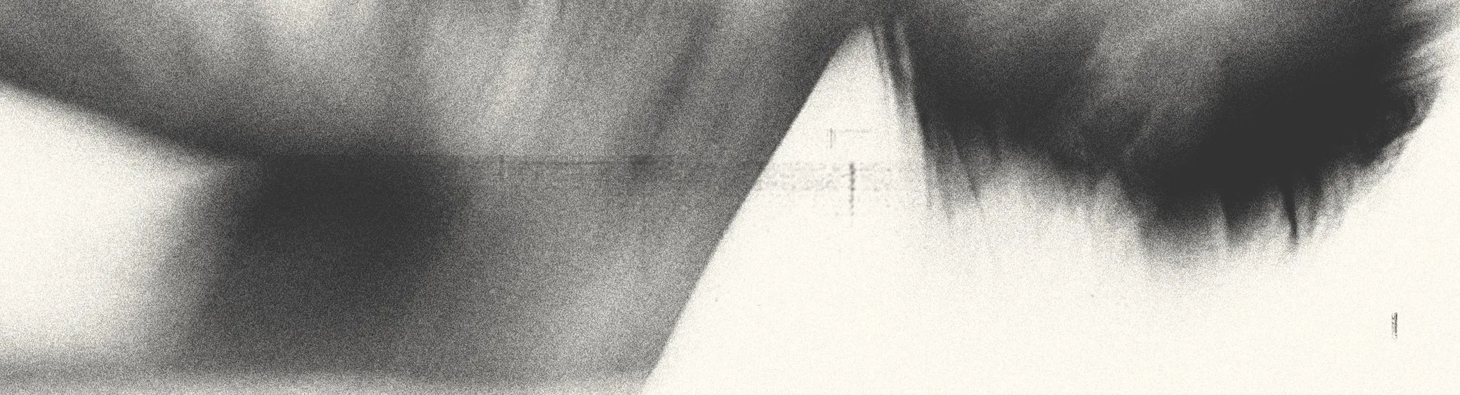 Long-exposure photograph, blurred, in warm greys
