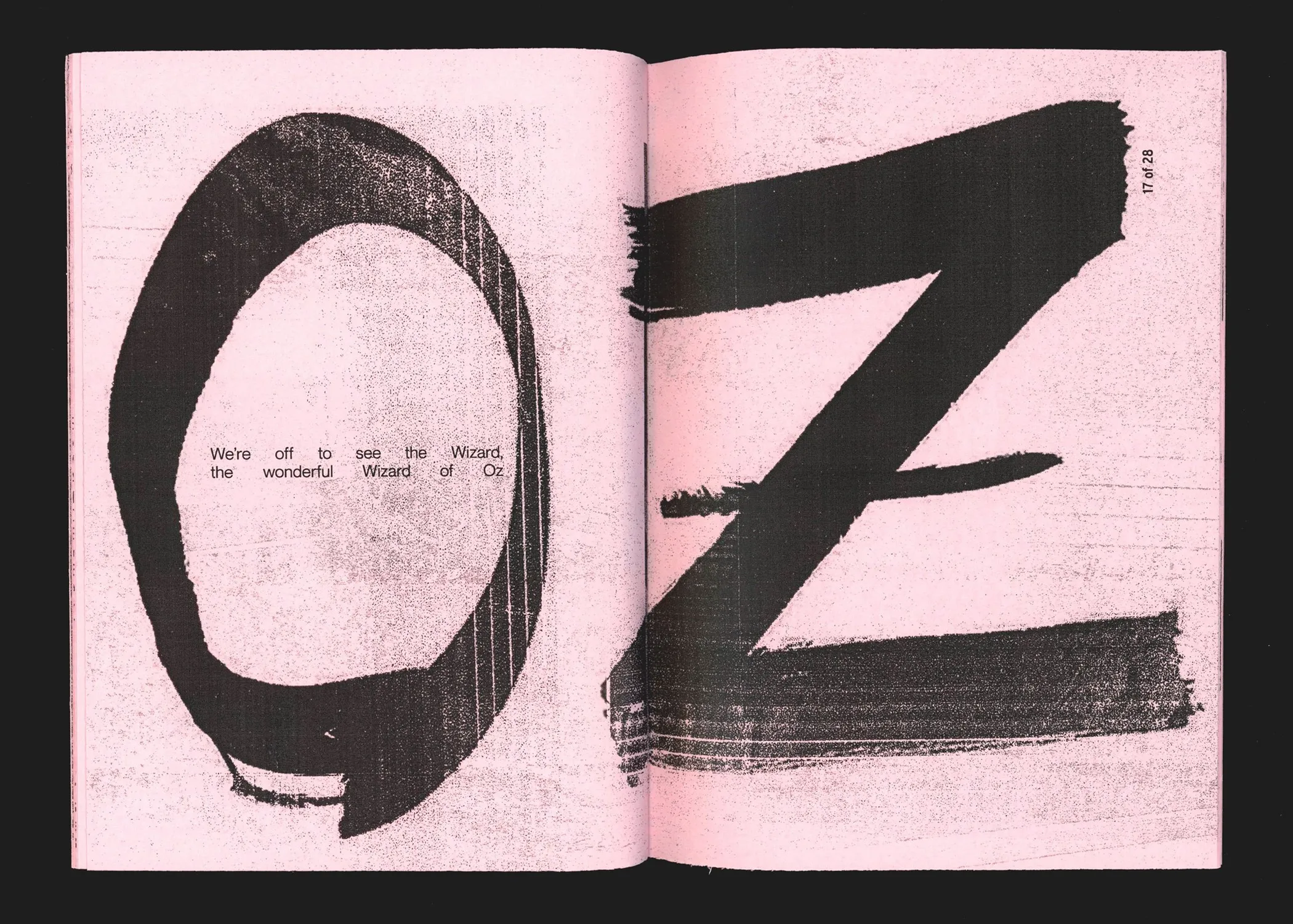 Spread: "OZ" in large brushed letters